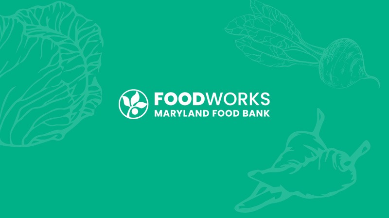 Maryland Food Bank FoodWorks logo with green vegetables